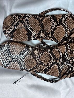 Snake Print Wrap Sandals in Brown and Black forever21.